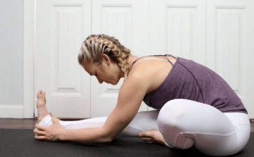 woman on sitting pigeon pose