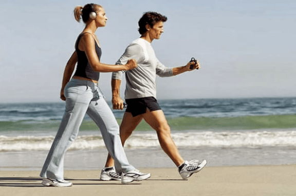 walking exercise by the beach