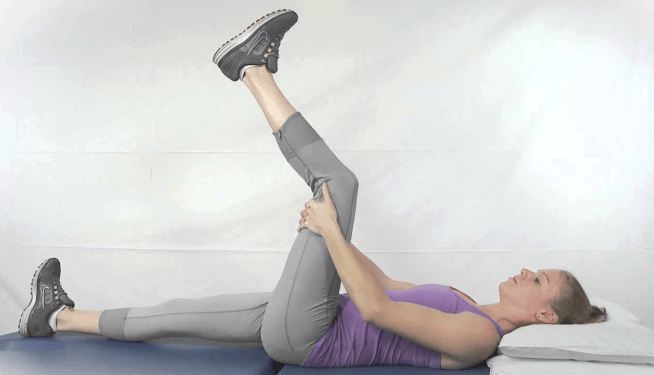 woman doing the leg extension stretch